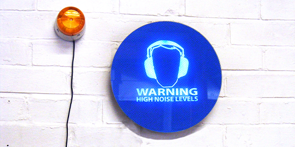 noise activated warning sign
